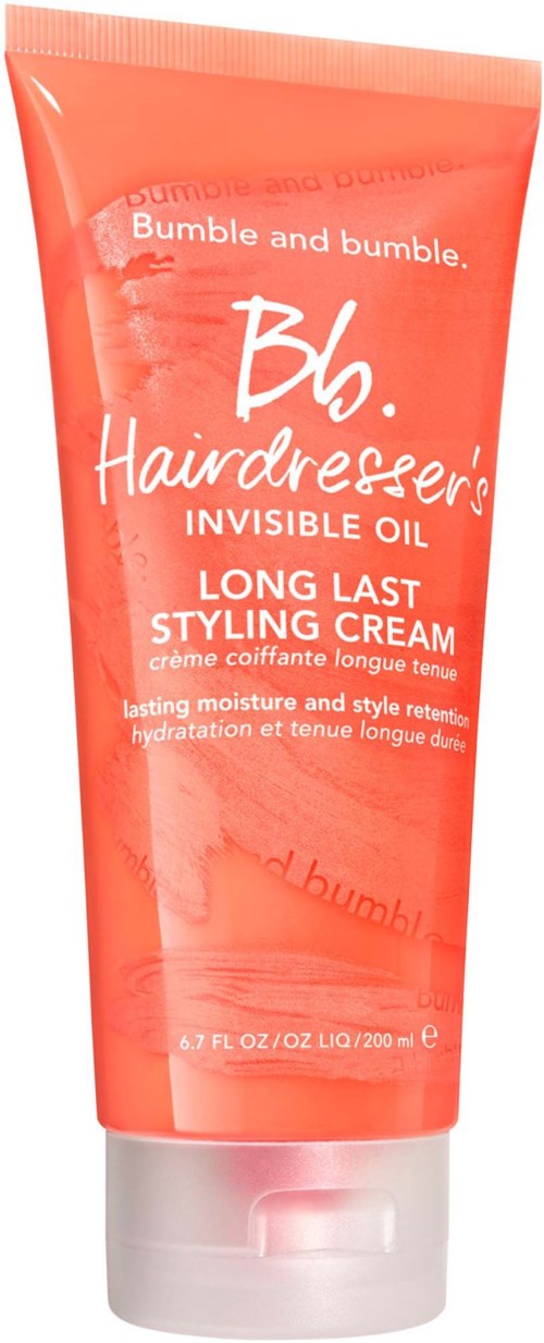 Eine Tube von Bumble and bumble Hairdresser's Invisible Oil Long Last Styling Cream. Rosa Farbe mit weißem Text.