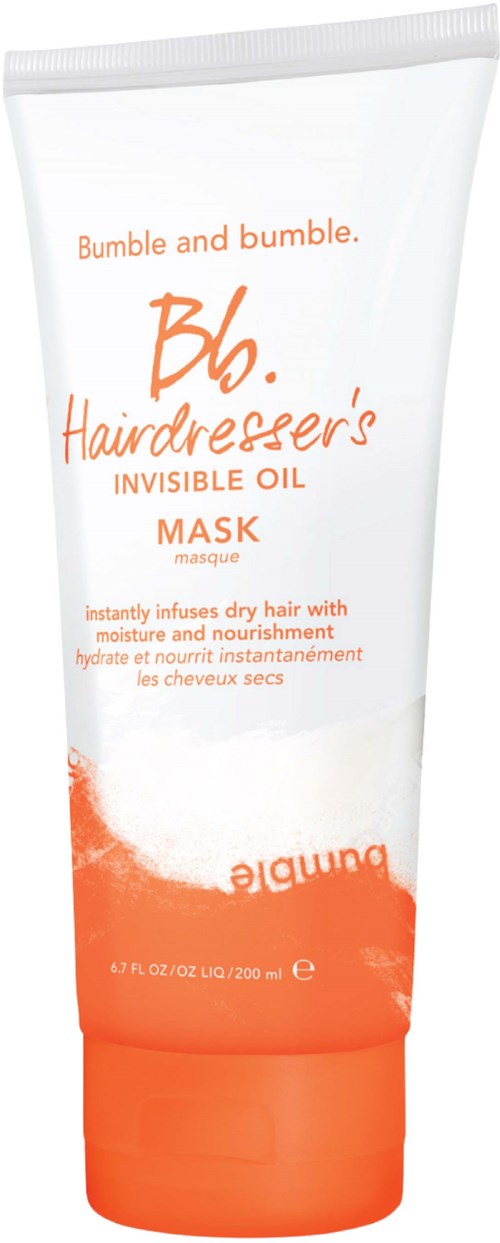Ein weiß-orangefarbiger Tube von Bumble and Bumble Hairdresser's Invisible Oil Mask für trockenes Haar.