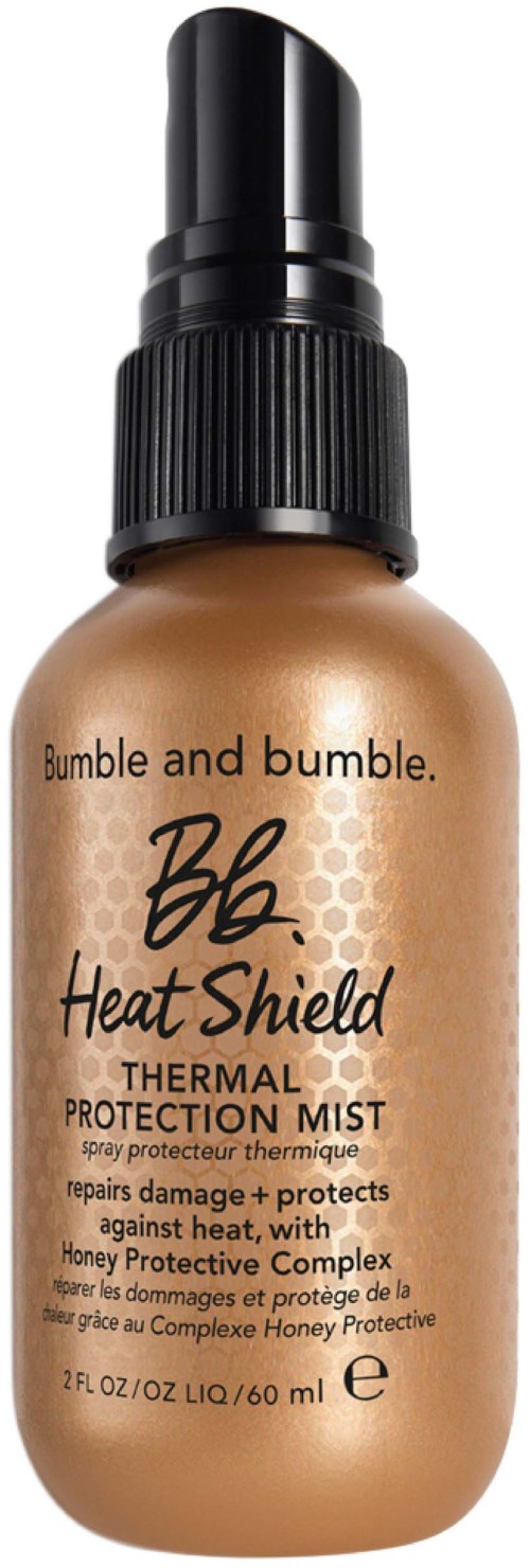 Eine Sprühflasche von Bumble and Bumble Heat Shield Thermal Protection Mist mit schwarzem Deckel und beigem Etikett.