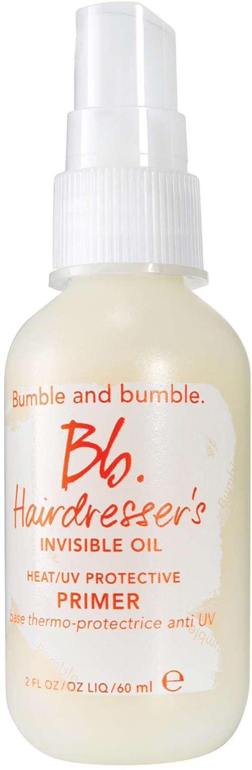 Eine kleine weiße Sprühflasche mit der Beschriftung 'Bumble and Bumble. Hairdresser's Invisible Oil. Heat/UV Protective Primer.'