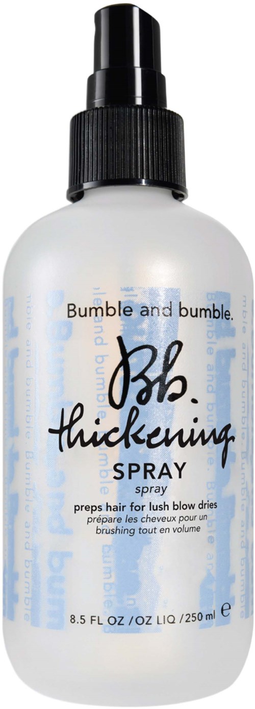 Eine weiße Flasche mit schwarzem Sprühkopf, beschriftet Bumble and bumble Verdickungsspray für Haare.