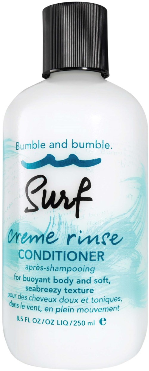 Eine weiße Flasche mit schwarzem Deckel, beschriftet Surf Creme Rinse Conditioner für mittleres Haar, Meeresbrise-Duft, 8,5 fl oz.