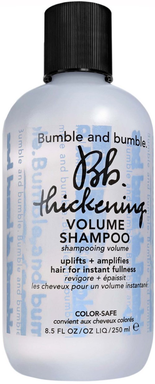 Eine weiße Flasche mit schwarzem Deckel für Bumble and bumble Thickening Volume Shampoo, mit Produktinformationen.