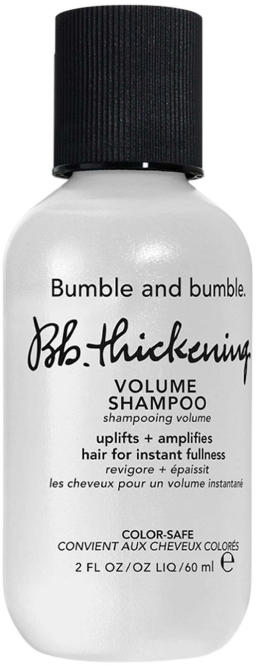 Eine kleine weiße Flasche mit Bumble and Bumble Volumenshampoo und schwarzem Deckel.