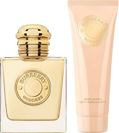 A Burberry Goddess perfume bottle with a gold cap and a pink body lotion tube with gold accents.