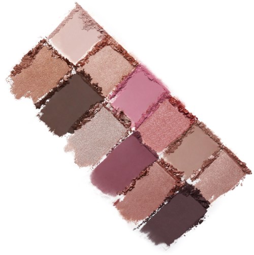 A palette of twelve pink, brown, and beige makeup shades in rectangular pans. They are arranged diagonally.