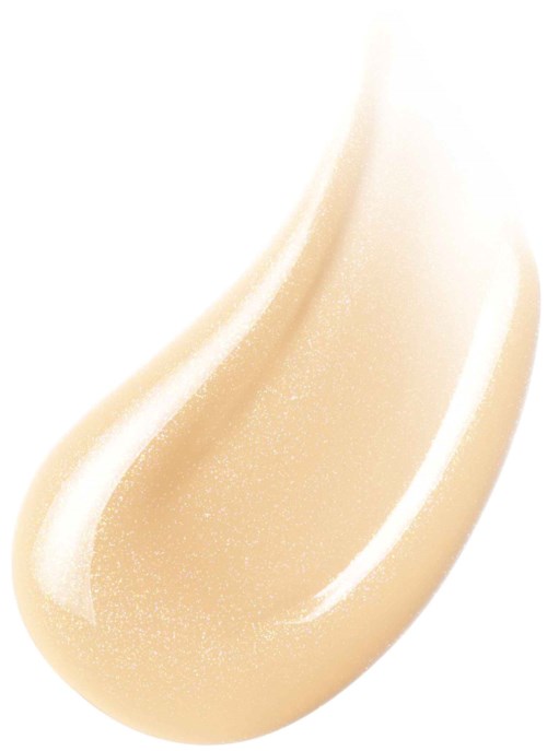 A swatch of creamy beige foundation with a glossy finish, smooth texture, and subtle shimmer.
