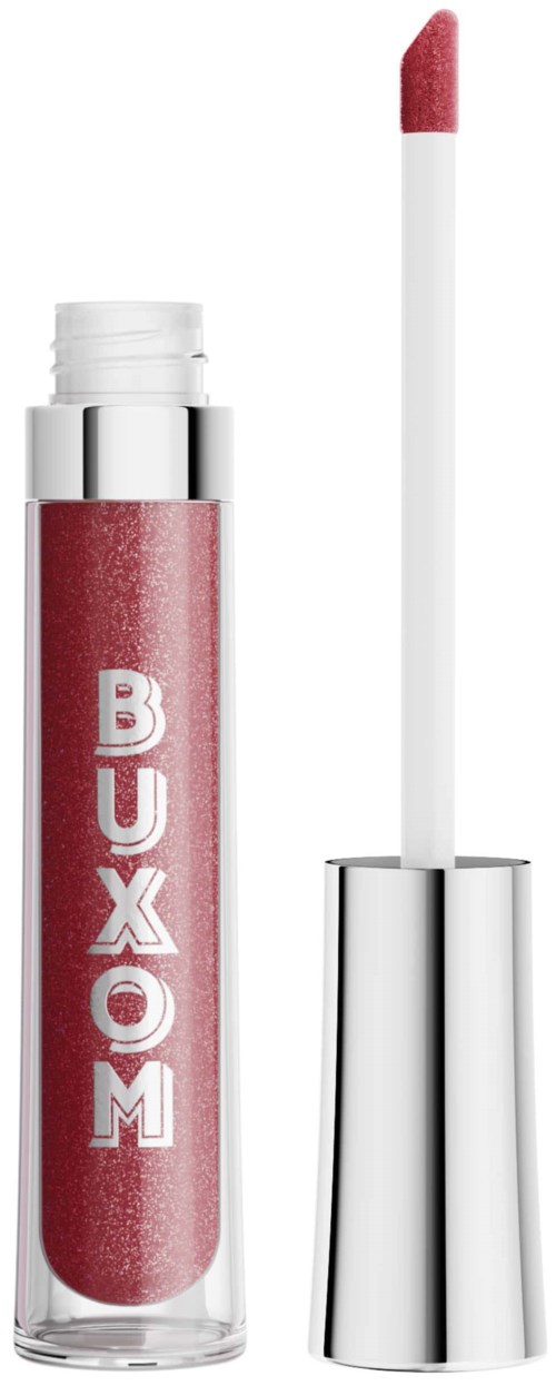 Pink lip gloss with a spelling label, open with the wand beside it.