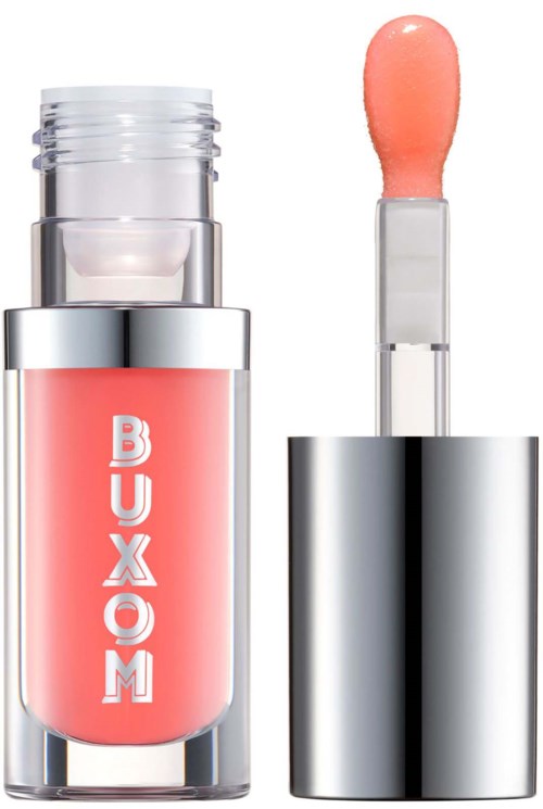 A lip gloss with a pink color and silver container, with the word 'BUXOM' on the bottle.