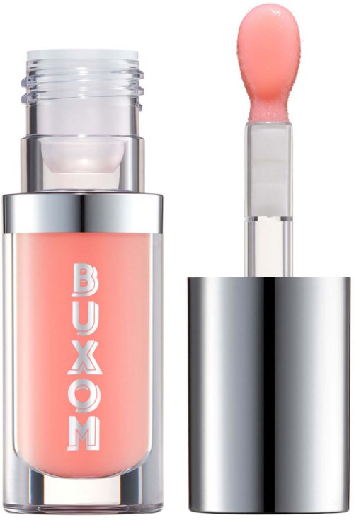 Lip gloss in a clear tube with silver cap, labeled 'BUXOM' in pink. Applicator wand has pink gloss.