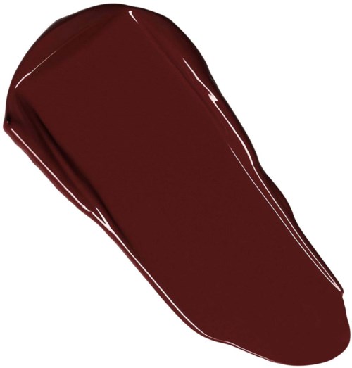 A large blob of dark red-brown liquid, likely nail polish, with shiny, smooth surface and rounded shape.