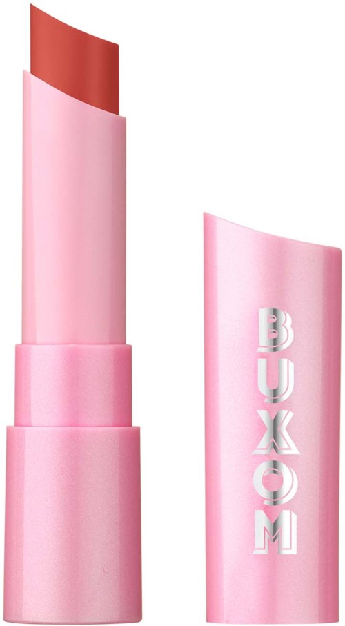 A pink lipstick tube with the word 'BUMOX' printed on the cap, and the lipstick itself is a reddish shade.
