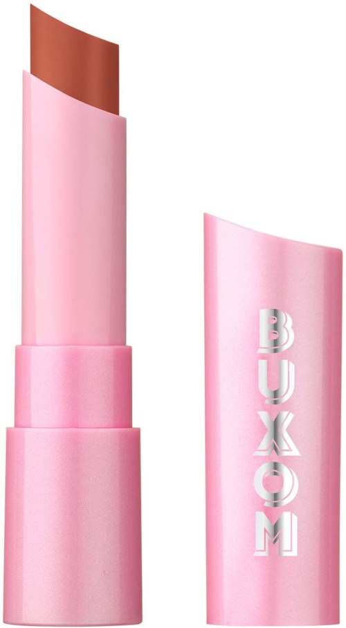 Pink lipstick in a pink tube with silver letters spelling BUXOM. The lipstick is partially extended.