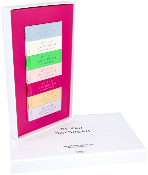 Ein Set bunter Haftnotizen mit verschiedenen Sprüchen in einer pinken und weißen Box.