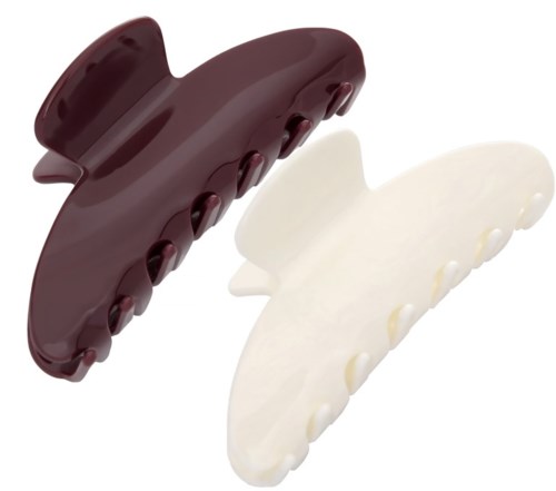 Two large plastic hair clips, one maroon and one white, with curved shapes and snaps to hold hair.