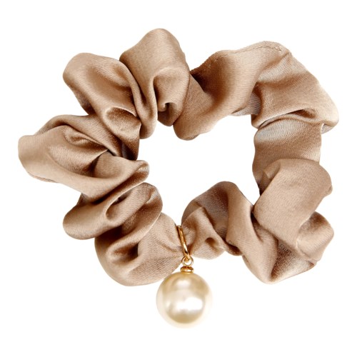 Beige scrunchie with a large pearl charm hanging from it.