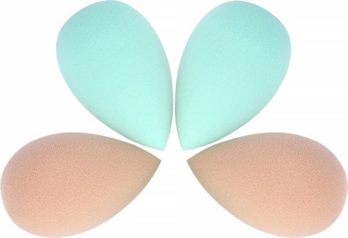Vier make-up sponsen in pastelkleuren zijn symmetrisch gerangschikt, met twee mintgroen en twee perzikkleurige sponsen.