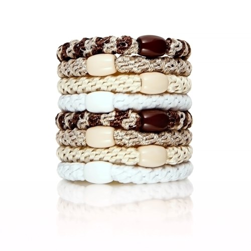 Stack of eight woven bracelets with beads, in brown, beige, and white colors.