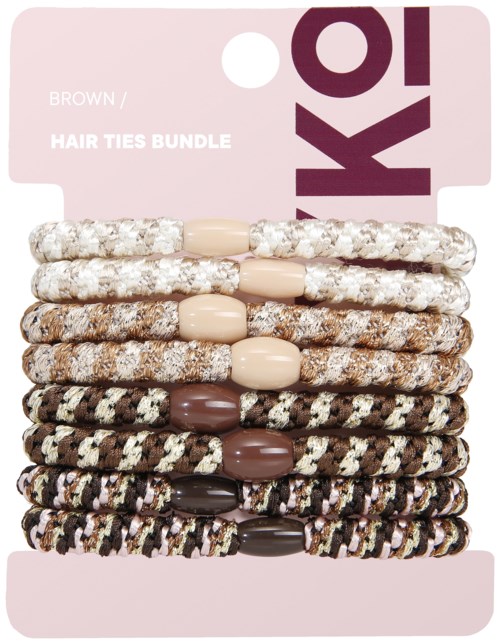 A set of brown and patterned hair ties with plastic ends on a pink backing card.