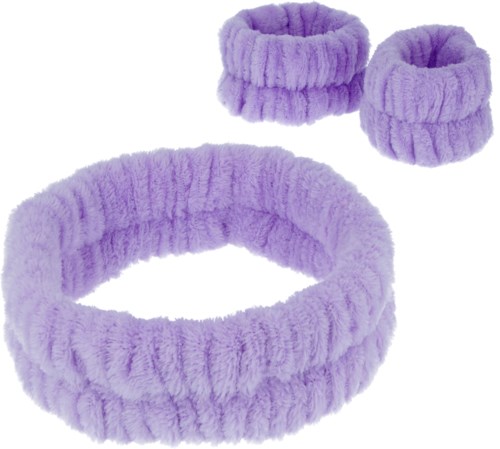 En uppsättning av tre fluffiga lila hårband i olika storlekar, mjuka och töjbara för hårstyling.