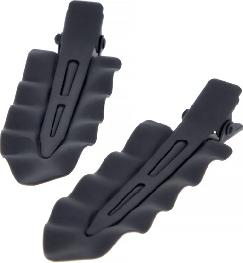 Two black plastic clips with ribbed grips and long slots, likely used for attaching or securing items.