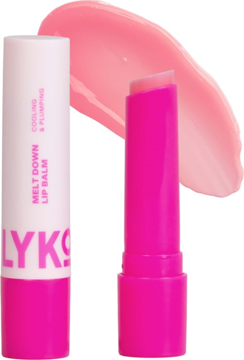 A pink lip balm with a swatch of light pinkish gloss in the background.