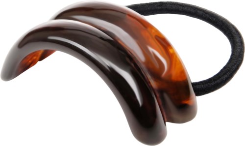 A hair accessory with two large, curved, tortoise-shell plastic pieces on a black elastic band.