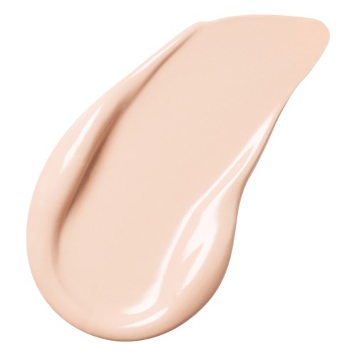 A beige-colored cream or lotion in a smooth, swirled shape.
