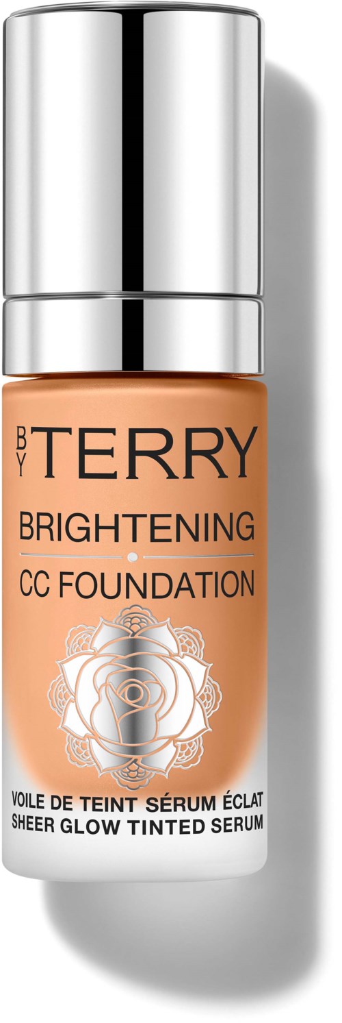 A small bottle of By Terry Brightening CC Foundation with a rose design on the label.