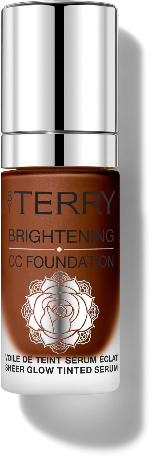 A small brown bottle with a silver cap, labeled 'Terry Brightening CC Foundation' and a rose logo.
