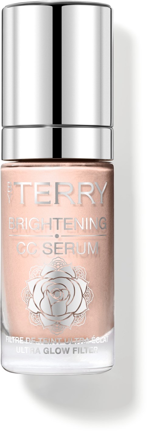 Pieni pullo vaaleanpunaisella seerumilla ja hopeakorkilla, merkintä TERRY Brightening CC Serum. Siinä on ruusun kuva.