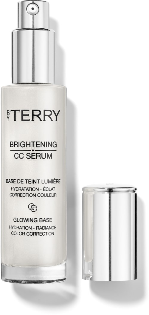 En vit flaska med silverlock och pump, märkt 'BY TERRY Brightening CC Serum' och 'Glowing Base'.