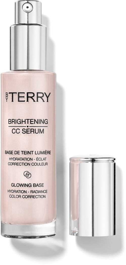 En rosa flaska märkt 'BY TERRY Brightening CC Serum' med silverlock och ett separat silverlock.