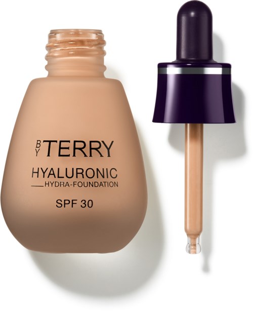 Meikkivoidepullo, jossa lukee 'BY TERRY HYALURONIC SPF 30', ja vieressä tippa-menetelmä.