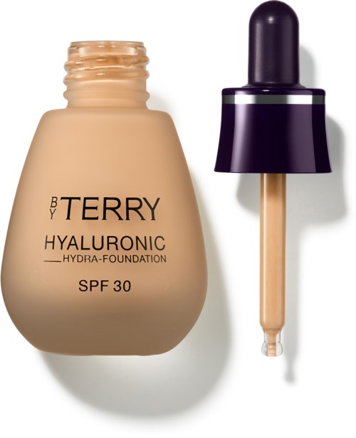 Beige meikkipullo, jossa musta korkki ja tiputin, merkitty 'HYALURONIC SPF 30'.