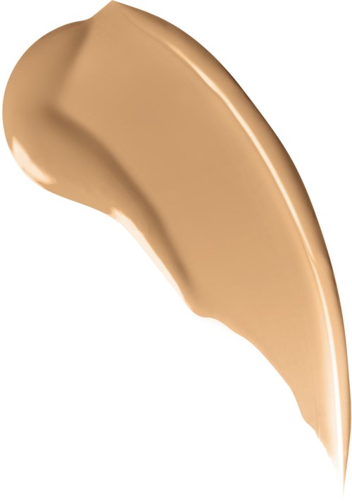 Beige tai vaaleanruskea kaareva läikkä nesteestä tai kerma, sileä pinta ja kiiltävä ulkonäkö.