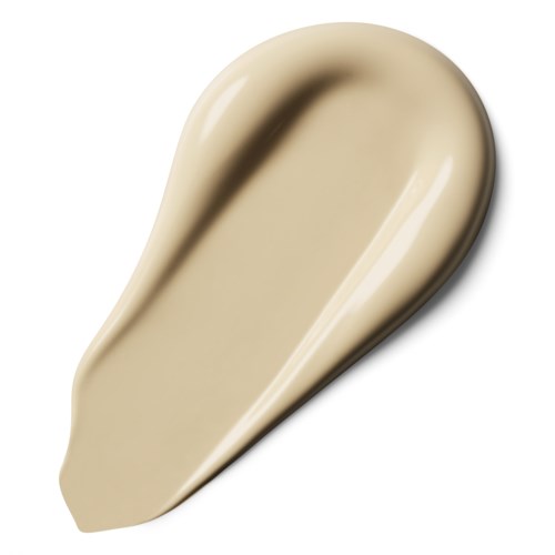 Beige, pidempi, kaareva esine, jolla on sileä pinta, muistuttaa kermaläikkää tai geeliä.