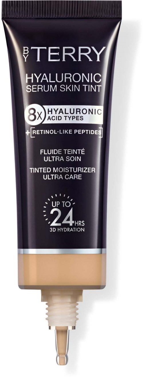 Rör av lätt täckande fuktkräm med hyaluronsyra, SPF 24 och beige nyans. Texten lyfter fram fördelar och ingredienser.