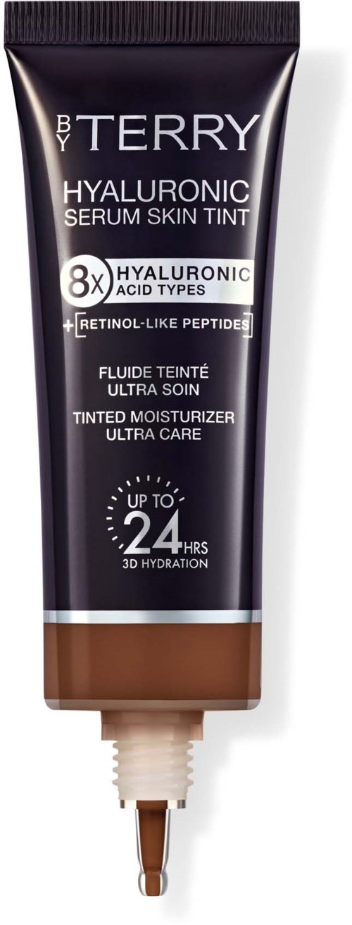 En svart tub med By Terry Hyaluronic Serum Skin Tint med en beige bottom, visar produktinformationen.