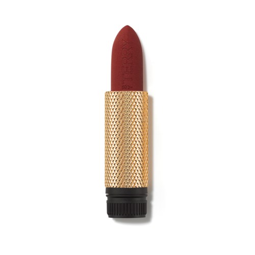 A lipstick tube reveals red lipstick with a gold and black body design.