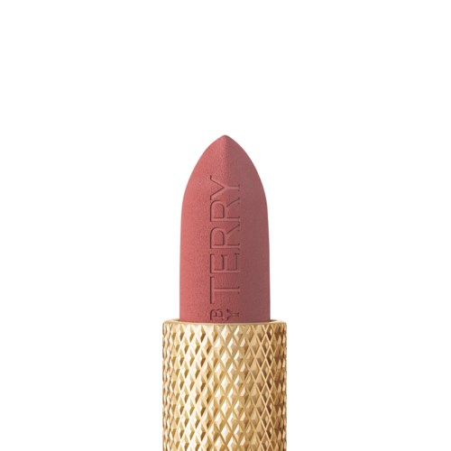 A lipstick with a gold, textured case and a pink shade.