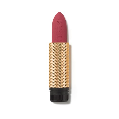 Lipstick designed to look like a magic wand, with a red tip and gold handle, labeled "STARRY".