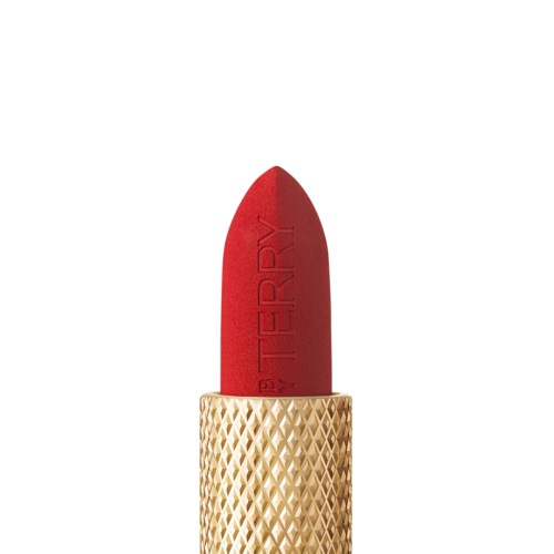 A red lipstick with a gold textured case and the word "STERRY" on the lipstick.
