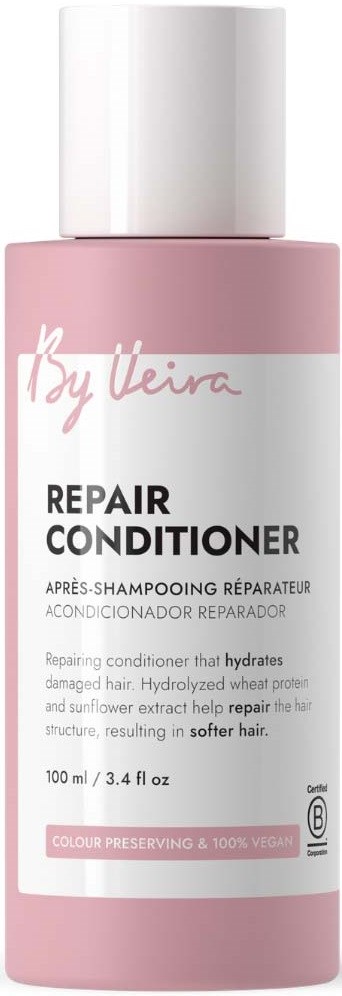Pink flaske med By Veira Repair Conditioner for skadet hår, fukter og reparerer hårstrukturen, 100 ml.