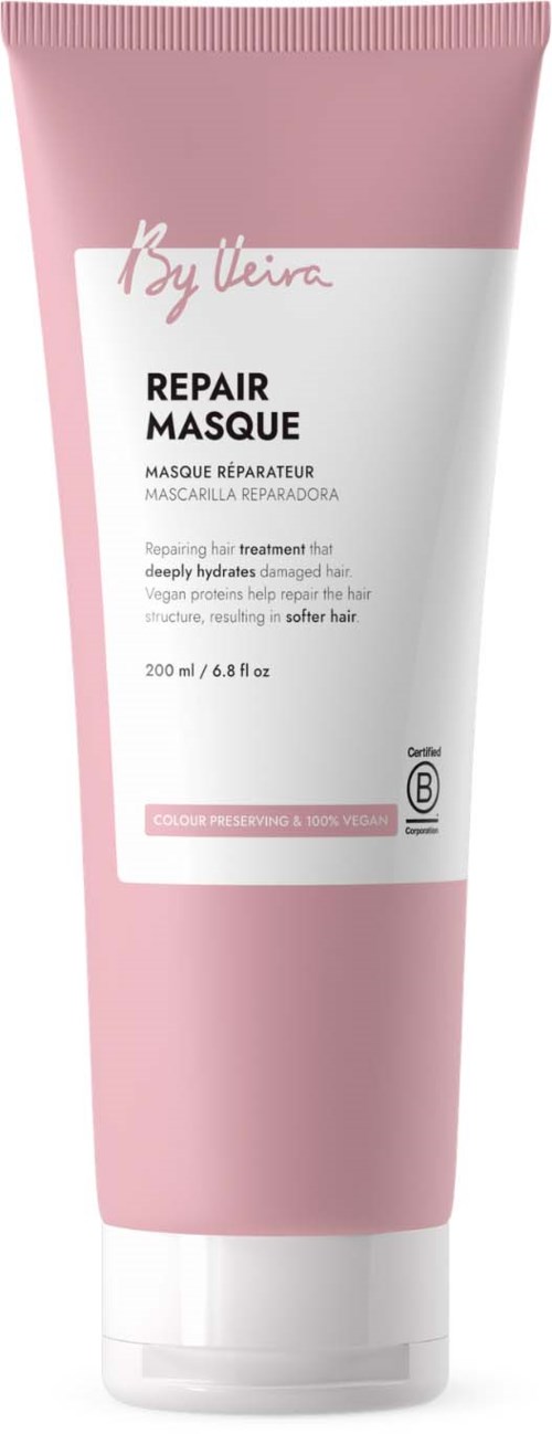 Rosa hårkur i tube med hvit etikett som viser produktnavn og beskrivelse.