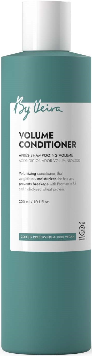 En teal flaske med By Weira Volume Conditioner med hvit cap, viser produktetikett og størrelse.
