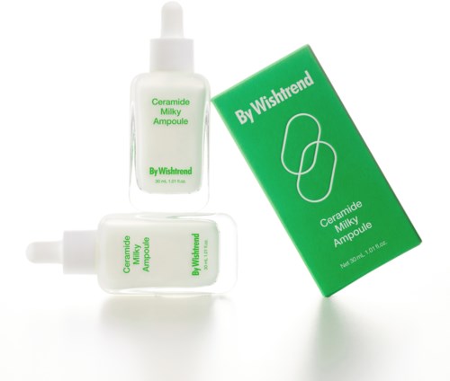 Zwei Flaschen mit Hautpflege-Serum und eine grüne Box mit weißem und grünem Text.