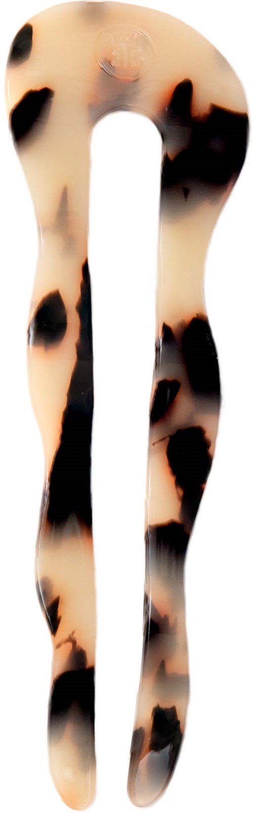 A hair clip with a leopard print pattern and a wavy shape.