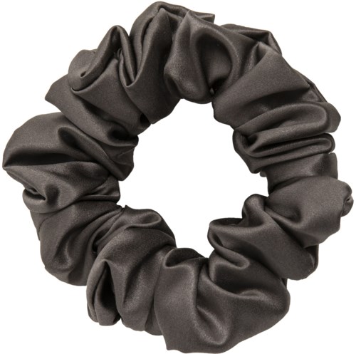 Ein großer schwarzer Stoffgummiband mit gerafftem Aussehen, das einen Kreis bildet.