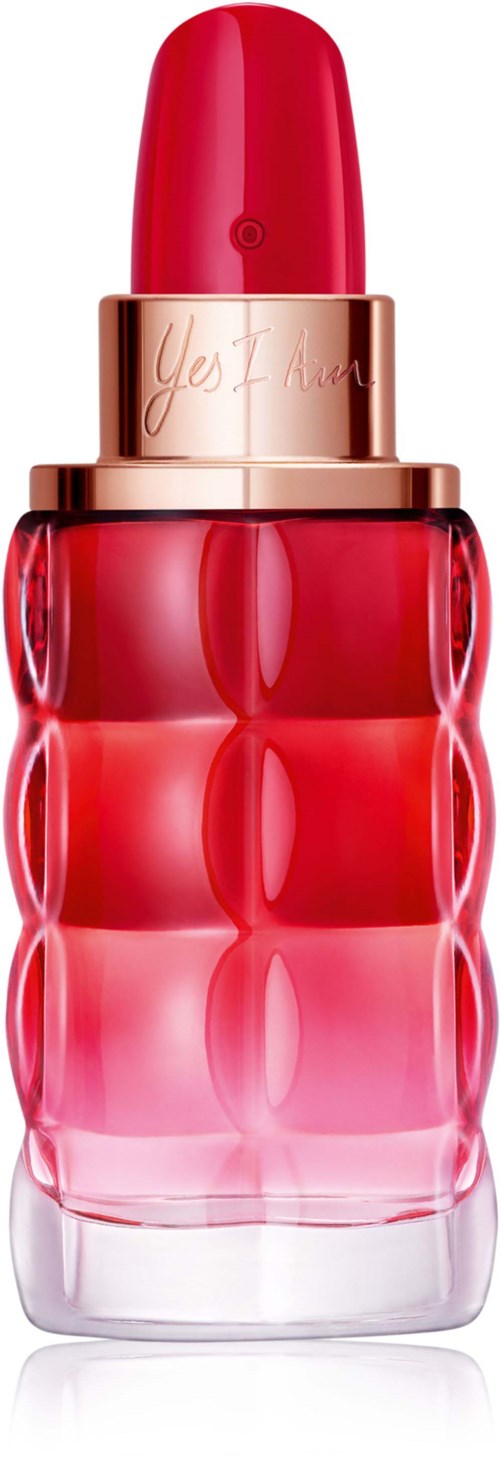 A red lipstick in a uniquely shaped bottle with a shiny gold band and a clear base.
